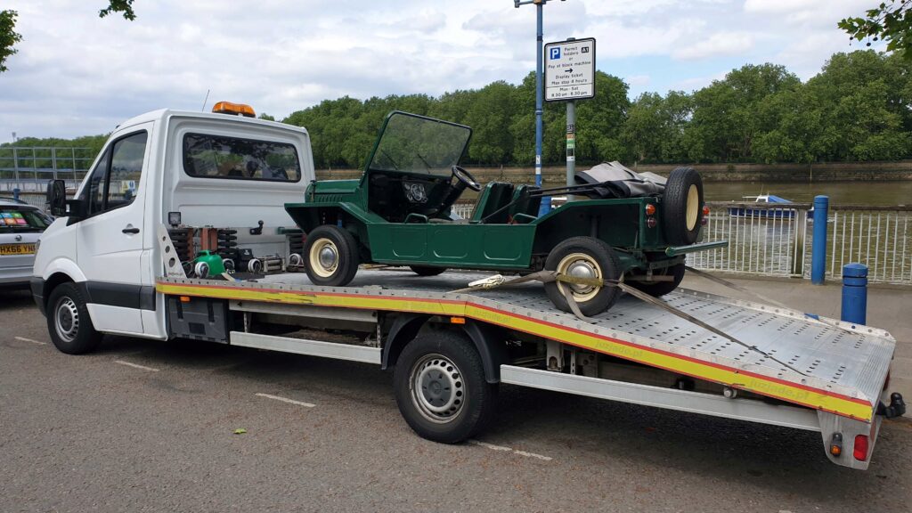 Classic car recovery and flatbed towing service London — London Auto Towing transporting a vintage vehicle safely on a recovery truck.