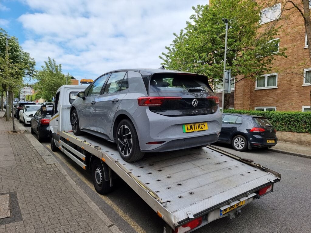Electric car towing service in London — Volkswagen ID.3 EV on flatbed tow truck