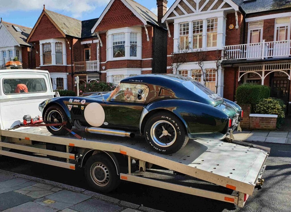 local car recovery and winching service London using flatbed recovery truck for non-driveable vehicle