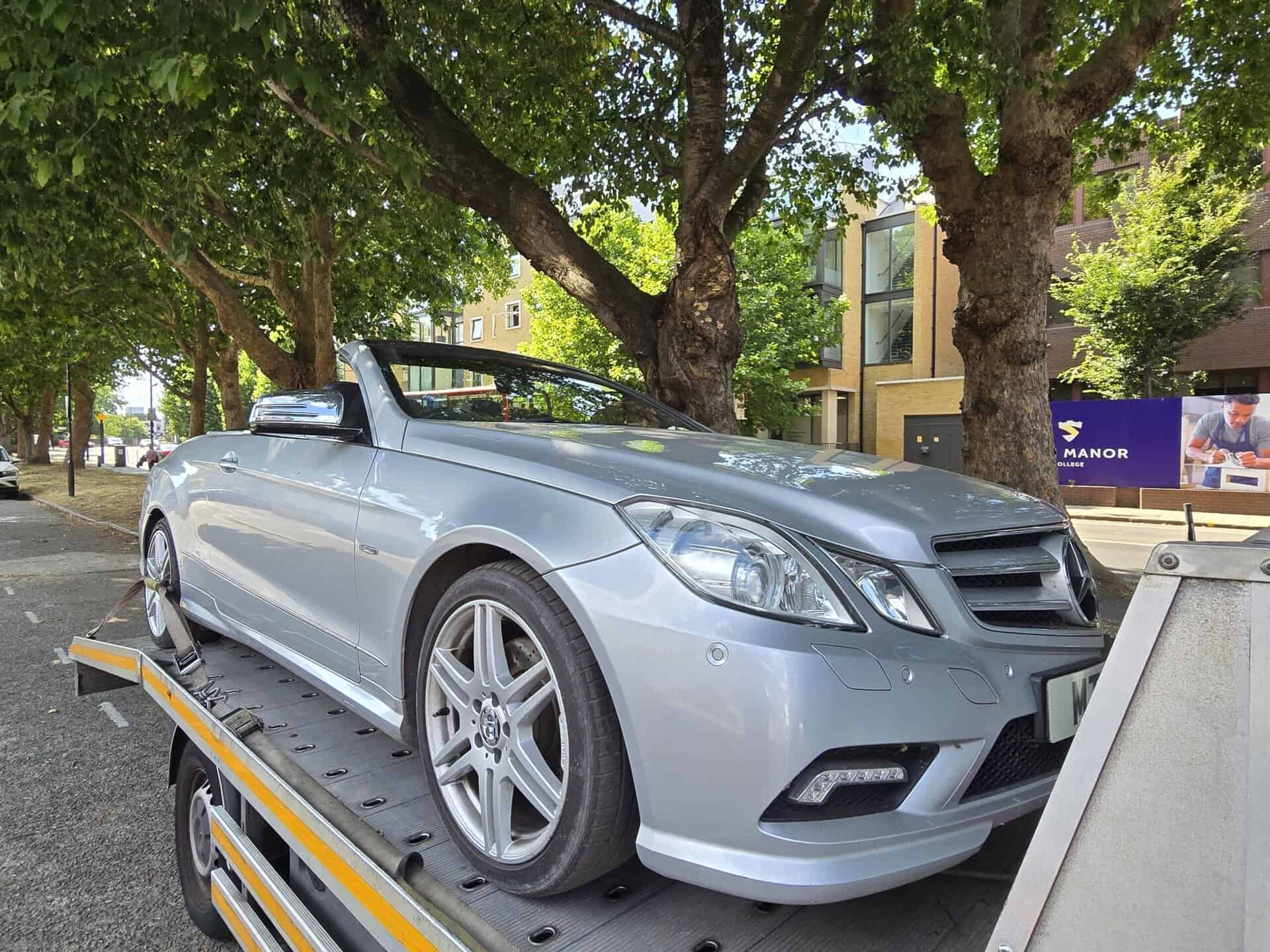 Mercedes convertible on flatbed tow truck — high value car recovery London by London Auto Towing.