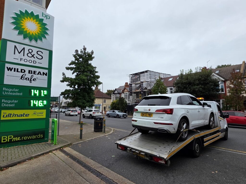Dealer, auction and European vehicle recovery with secure flatbed towing service