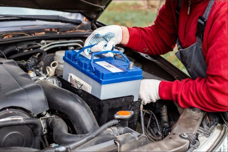 On-site battery replacement and jump start service by London Auto Towing
