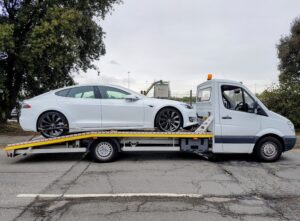 Tesla Model S being loaded onto our flatbed recovery truck during an emergency electric car recovery in London.