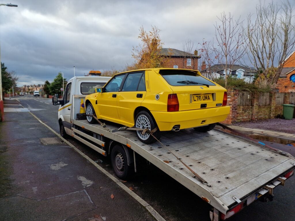 Lancia Delta Integrale loaded on our flatbed recovery truck during a high value car recovery job in London