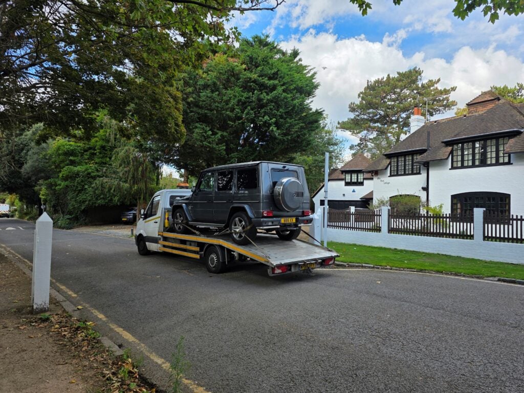 Flatbed car recovery of a Mercedes G-Class in a residential London street by London Auto Towing