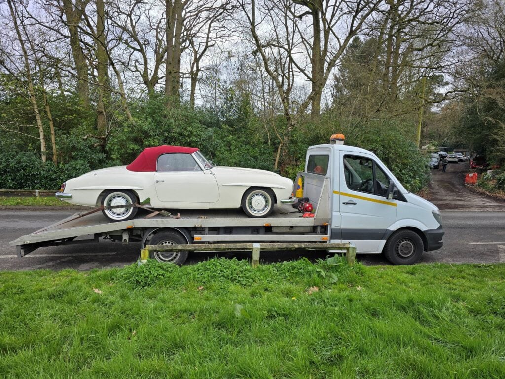 Classic Mercedes safely loaded on our flatbed recovery truck during a high value car transport job in London
