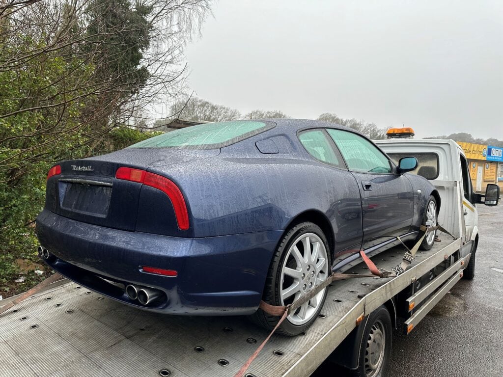 Maserati GranTurismo recovery on flatbed tow truck due to gearbox issues in London