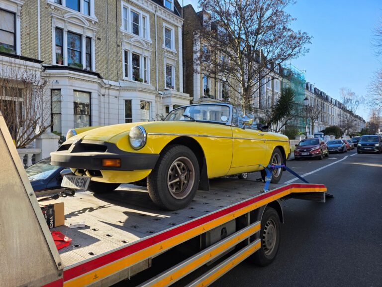 Classic car recovery Kingston secured safely on flatbed towing service by London Auto Towing