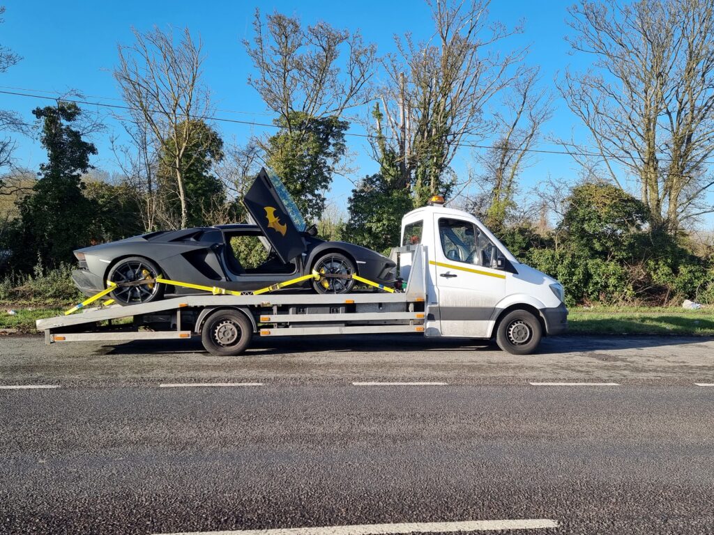 Car recovery Fulham and towing service for a Lamborghini Aventador using a professional flatbed tow truck in SW6.