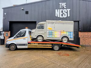 Professional van recovery Wimbledon service showing a classic Citroen H Van on a flatbed recovery truck in SW19 and SW20.
