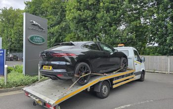 Jaguar I-Pace being recovered on our flatbed recovery truck during a local EV breakdown recovery service in London.